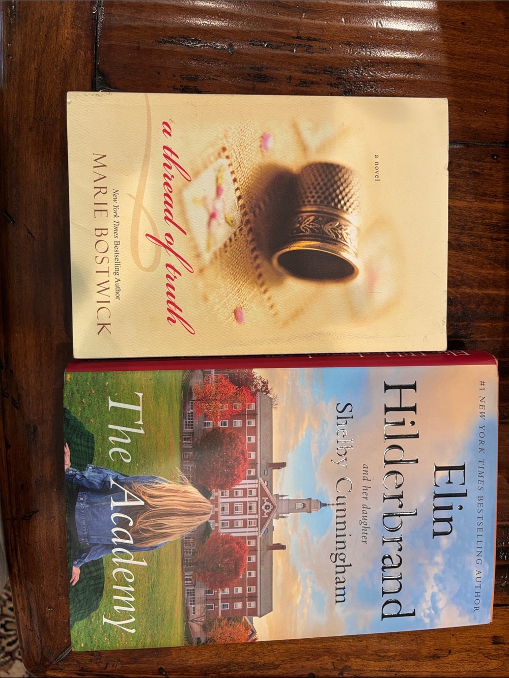 E. Hilderbrand, THE ACADEMY, Hardback & M. Bostwick, A THRED Of TRUTH, bundle